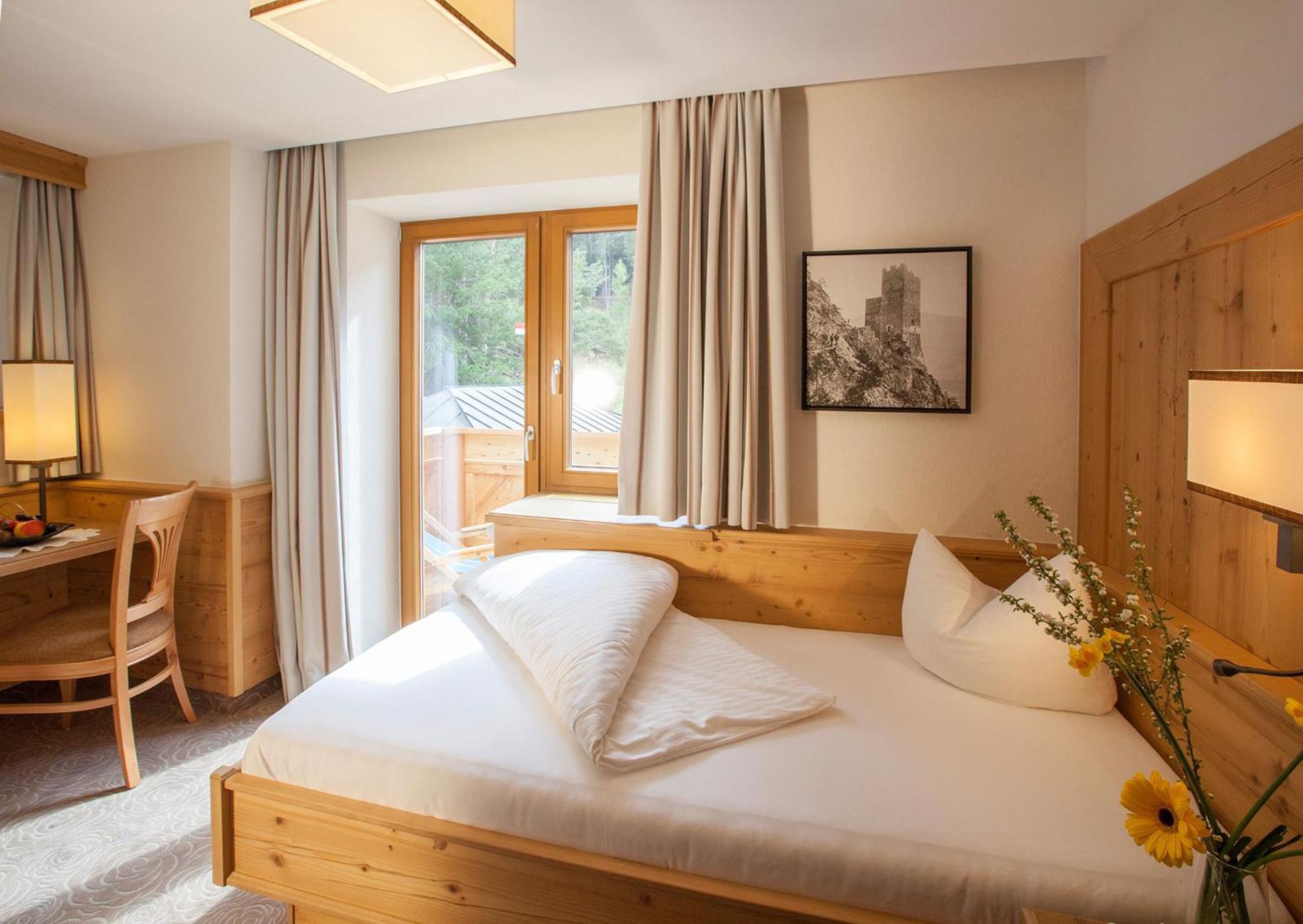 Huber Hotel Tramserhof Landeck Rom bilde